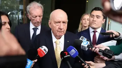 Indecent Assault Charges Involving Leading Australian Broadcaster Lessened